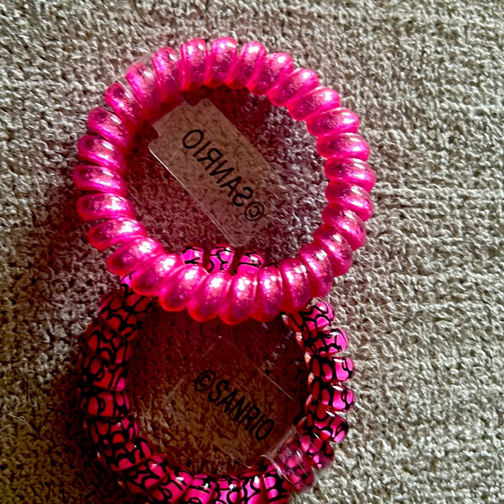 Pink and black hair tie + light pink sparkle hair tie